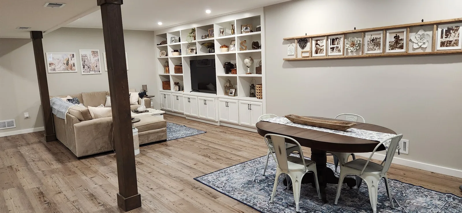 Finished basement living and dining area by New Beginnings Construction and Design