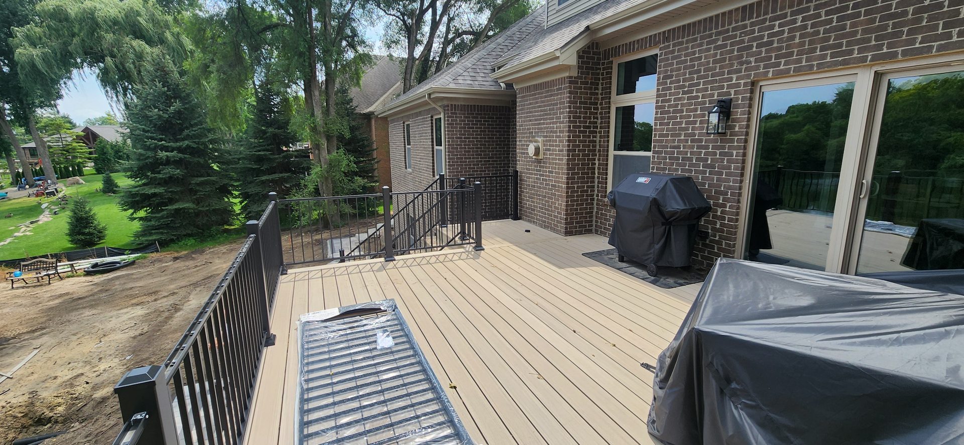 Composite deck surface and railing
