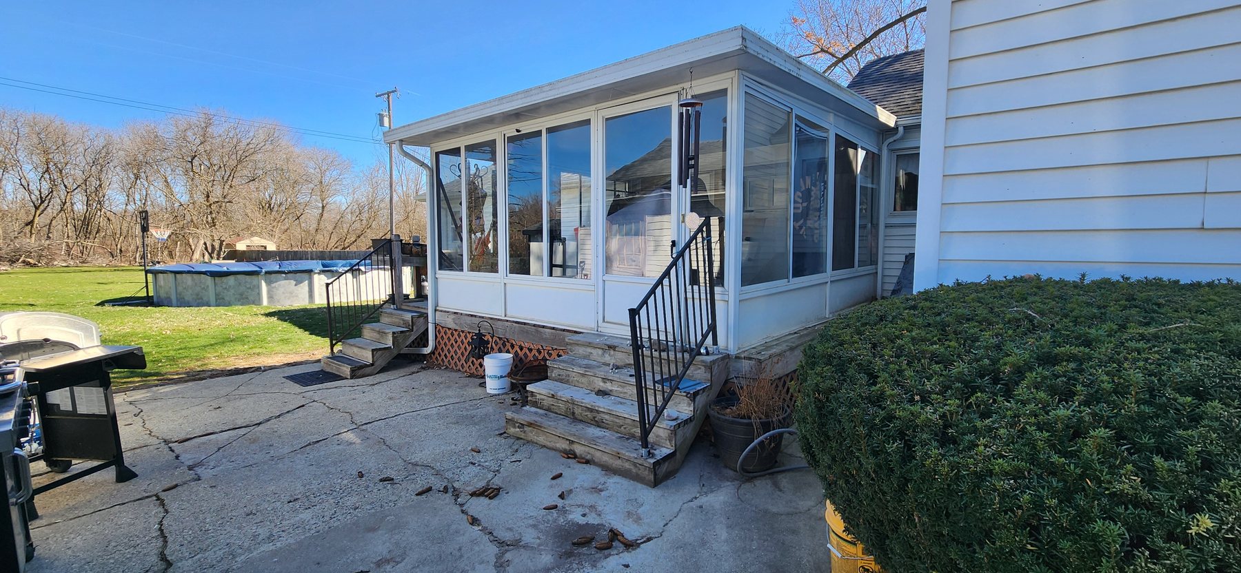 Original enclosed sunroom before reconstruction